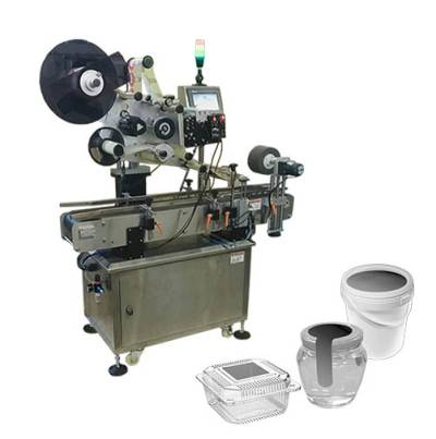 LABELING MACHINE FOR SELF-ADHESIVE LABEL ON CAP